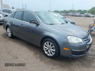 2010 Volkswagen Jetta Limited Edition z VIN 3VWRZ7AJXAM021351, wystawiony jako IAAI lot #42211272 z przebiegiem 157 086 mil mil oraz . Historia ofert i sprzedaży dostępna na DreamBid. Obrazek 1.
