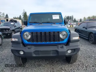 2024 Jeep Wrangler Willys with VIN 1C4PJXDG6RW287267, listed as a IAAI auction lot 41981301 with 8,996 mi miles and . Bid and sale history available at carsss.com. Image 13.