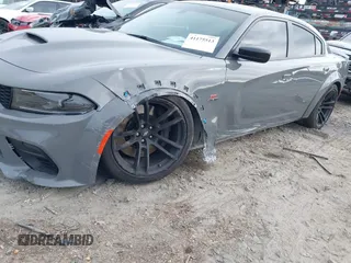 2023 Dodge Charger Scat Pack Widebody with VIN 2C3CDXGJ6PH646050, listed as a IAAI auction lot 41175513 with 7,684 mi miles and . Bid and sale history available at DreamBid. Image 17.