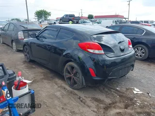 2013 Hyundai Veloster w/Black Int с VIN KMHTC6ADXDU084704, выставлен на аукционе IAAI как лот 42443297 с пробегом 111 587 миль миль и . История ставок и продаж доступна на DreamBid. Изображение 3.
