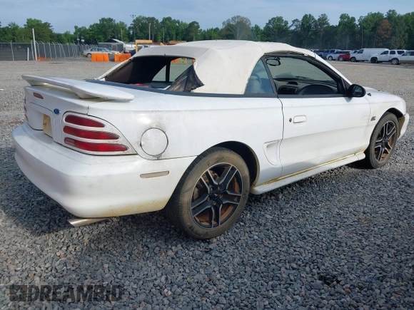 1994 Ford Mustang z VIN 1FALP45T2RF189589, wystawiony jako IAAI lot #42497220 z przebiegiem 98 565 mil mil oraz . Historia ofert i sprzedaży dostępna na DreamBid. Obrazek 4.