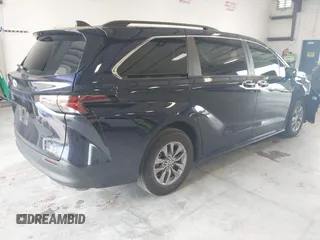 2023 Toyota Sienna XLE with VIN 5TDYRKEC2PS145751, listed as a IAAI auction lot 42661436 with 26,827 mi miles and . Bid and sale history available at DreamBid. Image 4.