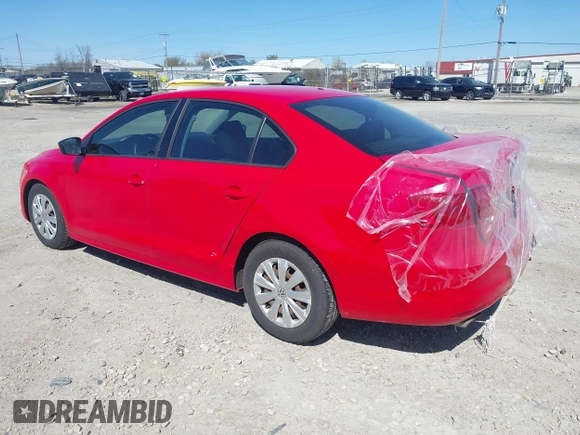 2014 Volkswagen Jetta S z VIN 3VW2K7AJ6EM305345, wystawiony jako IAAI lot #42222726 z przebiegiem 113 350 mil mil oraz . Historia ofert i sprzedaży dostępna na DreamBid. Obrazek 3.