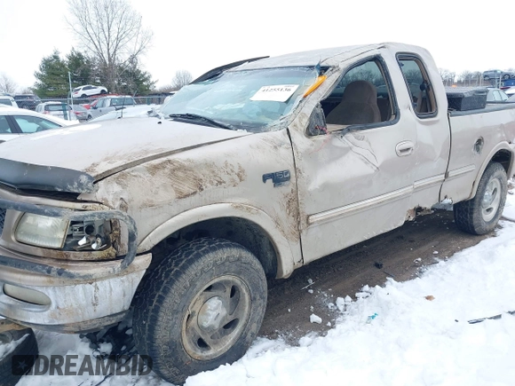 1998 Ford F-150 with VIN 1FTZX18W4WNB04665, listed as a IAAI auction lot 41255136 with 182,272 mi miles and . Bid and sale history available at DreamBid. Image 6.