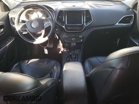2019 Jeep Cherokee Overland with VIN 1C4PJMJN3KD173830, listed as a Copart auction lot 87229794 with 82,433 mi miles and Salvage title. Bid and sale history available at DreamBid. Image 8.