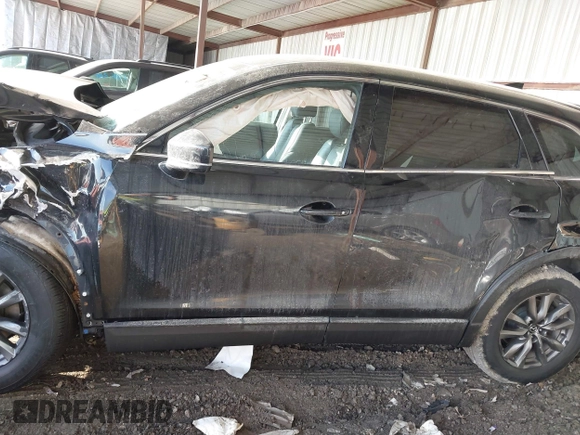 2016 Mazda CX-9 Touring with VIN JM3TCACY8G0102157, listed as a IAAI auction lot 41670673 with 87,796 mi miles and . Bid and sale history available at carsss.com. Image 15.