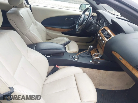 2007 BMW 6 Series 650i z VIN WBAEK13567CN83841, wystawiony jako IAAI lot #42380370 z przebiegiem 106 792 mil mil oraz . Historia ofert i sprzedaży dostępna na DreamBid. Obrazek 5.