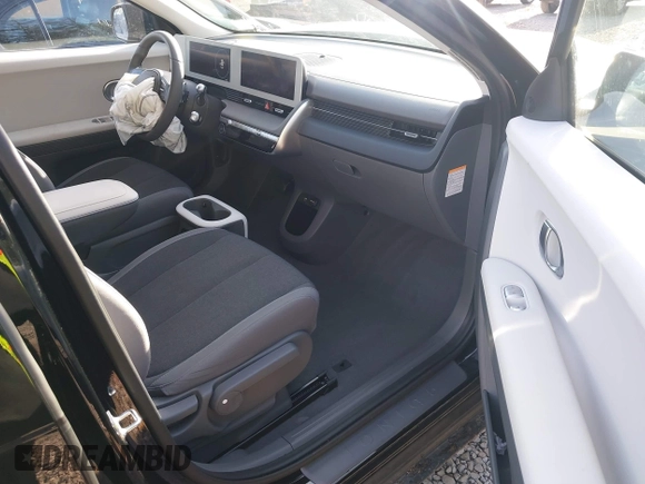 2024 Hyundai Ioniq 5 SE z VIN KM8KMDDF5RU253755, wystawiony jako IAAI lot #41356002 z przebiegiem 3 997 mil mil oraz . Historia ofert i sprzedaży dostępna na DreamBid. Obrazek 5.