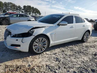 2015 Jaguar XF I4 T Premium with VIN SAJWA0FS5FPU58943, listed as a Copart auction lot 46973695 with 98,011 mi miles and Salvage Title. Bid and sale history available at carsss.com. Image 1.