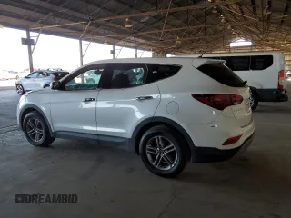 2018 Hyundai Santa Fe 2.4L z VIN 5XYZTDLB2JG550539, wystawiony jako Copart lot #58232955 z przebiegiem 125 810 mil mil oraz Czysty tytuł • Clean title. Historia ofert i sprzedaży dostępna na DreamBid. Obrazek 2.