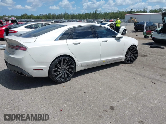 2017 Lincoln MKZ Select z VIN 3LN6L5C98HR607862, wystawiony jako IAAI lot #42072856 z przebiegiem 37 357 mil mil oraz . Historia ofert i sprzedaży dostępna na DreamBid. Obrazek 4.