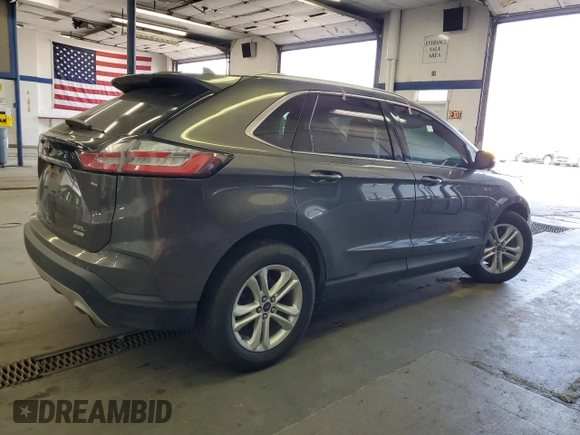 2019 Ford Edge SEL with VIN 2FMPK4J95KBB76844, listed as a Copart auction lot 59323925 with 122,326 mi miles and Salvage title. Bid and sale history available at DreamBid. Image 3.