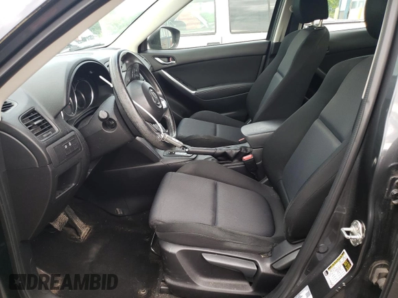 2014 Mazda CX-5 Sport with VIN JM3KE2BE9E0372370, listed as a Copart auction lot 58980165 with 175,477 mi miles and Salvage title. Bid and sale history available at DreamBid. Image 7.
