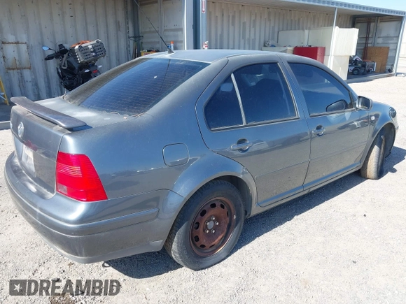 2003 Volkswagen Jetta GL z VIN 3VWRK69M43M117878, wystawiony jako IAAI lot #42553211 z przebiegiem 183 524 mil mil oraz . Historia ofert i sprzedaży dostępna na DreamBid. Obrazek 4.