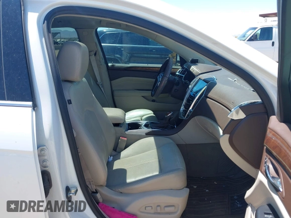 2013 Cadillac SRX Luxury Collection with VIN 3GYFNCE38DS580168, listed as a IAAI auction lot 42122314 with 136,814 mi miles. Bid and sale history available at carsss.com. Image 5.