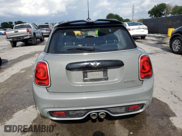 2018 MINI Hardtop 4 Door Cooper S с VIN WMWXU3C5XJ2F51599, выставлен на аукционе Copart как лот 59171195 с пробегом 53 484 миль миль и Списание • Salvage title. История ставок и продаж доступна на DreamBid. Изображение 6.