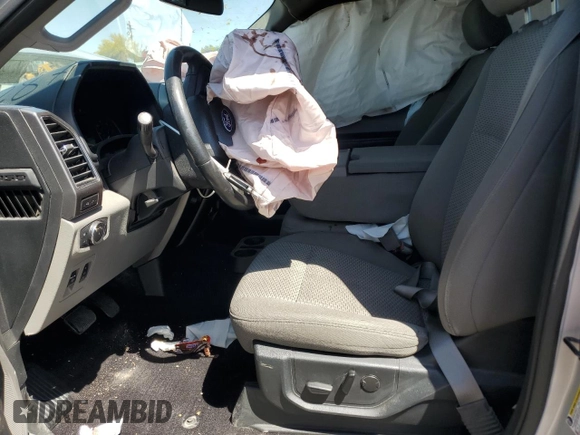 2019 Ford F-150 XL with VIN 1FTFW1E59KKC70287, listed as a Copart auction lot 52596015 with 113,089 mi miles and Salvage Title. Bid and sale history available at carsss.com. Image 7.