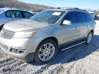 2014 Chevrolet Traverse LT with VIN 1GNKRGKD7EJ296294, listed as a IAAI auction lot 41285677 with 156,516 mi miles. Bid and sale history available at carsss.com. Image 2.
