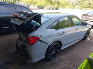 2022 Honda Civic Si with VIN 2HGFE1E52NH474042, listed as a IAAI auction lot 42099415 with 26,828 mi miles and . Bid and sale history available at DreamBid. Image 4.