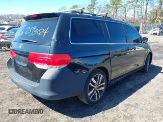 2009 Honda Odyssey EX-L with VIN 5FNRL38759B055396, listed as a IAAI auction lot 41863703 with 999,999 mi miles. Bid and sale history available at carsss.com. Image 4.