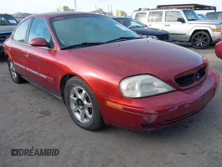 2000 Mercury Sable z VIN 1MEFM53U1YG615085, wystawiony jako IAAI lot #41492603 z przebiegiem 186 763 mil mil oraz . Historia ofert i sprzedaży dostępna na DreamBid. Obrazek 1.