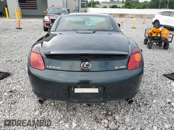 2002 Lexus SC 430 with VIN JTHFN48Y920006524, listed as a Copart auction lot 64680695 with 166,118 mi miles and Salvage title. Bid and sale history available at DreamBid. Image 6.