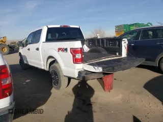 2019 Ford F-150 XL with VIN 1FTEW1E51KKE18332, listed as a Copart auction lot 86268344 with 141,566 mi miles and Salvage Title. Bid and sale history available at carsss.com. Image 2.