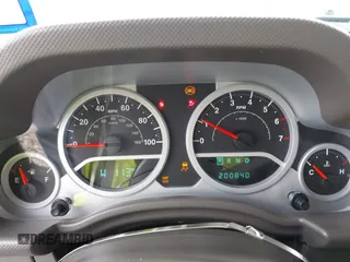 2007 Jeep Wrangler Unlimited Sahara with VIN 1J4GA59187L187656, listed as a IAAI auction lot 42554114 with 200,840 mi miles and . Bid and sale history available at DreamBid. Image 7.