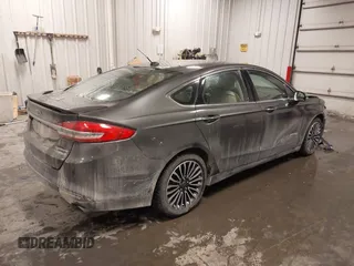 2018 Ford Fusion Hybrid Titanium with VIN 3FA6P0RU4JR147831, listed as a IAAI auction lot 41586033 with 101,088 mi miles. Bid and sale history available at carsss.com. Image 4.