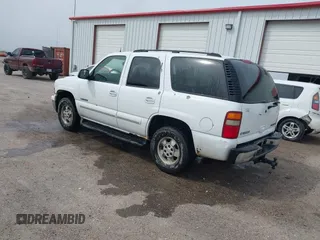 2003 Chevrolet Tahoe LS with VIN 1GNEC13T13R206573, listed as a IAAI auction lot 41931422 with 280,674 mi miles. Bid and sale history available at carsss.com. Image 3.