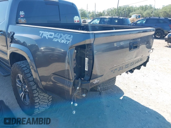 2017 Toyota Tacoma SR5 with VIN 3TMCZ5AN4HM052380, listed as a IAAI auction lot 42277918 with 62,238 mi miles and . Bid and sale history available at DreamBid. Image 6.