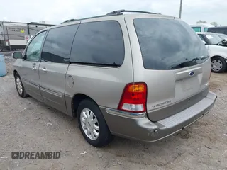 2002 Ford Windstar LTD with VIN 2FMDA58412BB61148, listed as a IAAI auction lot 42106861 with 81,828 mi miles and . Bid and sale history available at carsss.com. Image 3.