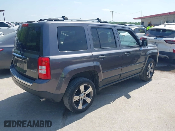 2016 Jeep Patriot Latitude with VIN 1C4NJRFB7GD658594, listed as a IAAI auction lot 42066483 with 146,492 mi miles. Bid and sale history available at carsss.com. Image 4.
