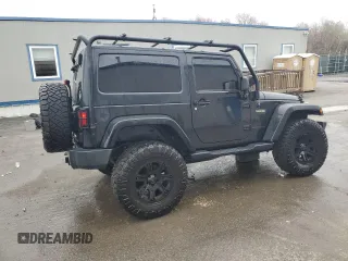 2017 Jeep Wrangler Sport z VIN 1C4AJWAG4HL563093, wystawiony jako Copart lot #51603125 z przebiegiem 105 618 mil mil oraz Szkoda całkowita • Salvage title. Historia ofert i sprzedaży dostępna na DreamBid. Obrazek 3.