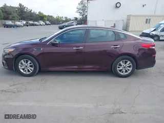 2019 Kia Optima LX with VIN 5XXGT4L36KG284965, listed as a IAAI auction lot 40374239 with 64,351 mi miles. Bid and sale history available at carsss.com. Image 14.
