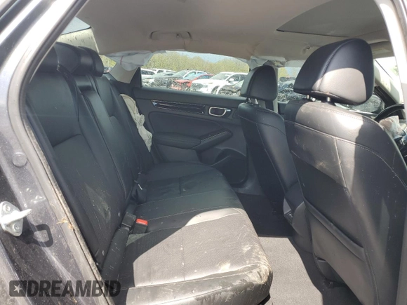 2022 Honda Civic Touring z VIN 2HGFE1F91NH304319, wystawiony jako Copart lot #55896485 z przebiegiem 56 476 mil mil oraz Szkoda całkowita • Salvage title. Historia ofert i sprzedaży dostępna na DreamBid. Obrazek 10.