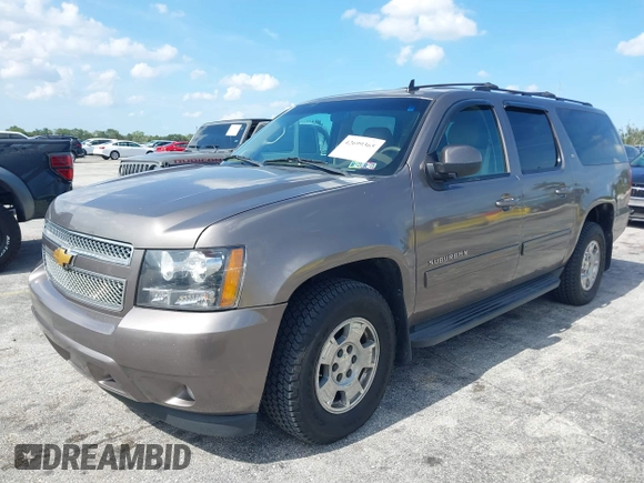 2012 Chevrolet Suburban LT with VIN 1GNSKJE72CR130111, listed as a IAAI auction lot 42699365 with 216,827 mi miles and . Bid and sale history available at DreamBid. Image 17.