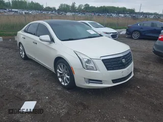 2013 Cadillac XTS Luxury with VIN 2G61P5S38D9117957, listed as a IAAI auction lot 42266578 with 212,114 mi miles and . Bid and sale history available at DreamBid. Image 1.
