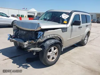 2009 Dodge Nitro SE with VIN 1D8GT28K99W513413, listed as a IAAI auction lot 39462494 with 196,456 mi miles. Bid and sale history available at carsss.com. Image 19.