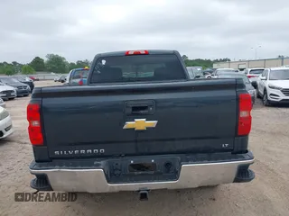 2018 Chevrolet Silverado 1500 LT with VIN 1GCRCREC9JZ105218, listed as a IAAI auction lot 40778682 with 124,621 mi miles and . Bid and sale history available at DreamBid. Image 16.
