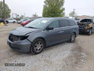 2013 Honda Odyssey EX z VIN 5FNRL5H47DB032096, wystawiony jako IAAI lot #42149190 z przebiegiem 149 836 mil mil oraz . Historia ofert i sprzedaży dostępna na DreamBid. Obrazek 2.
