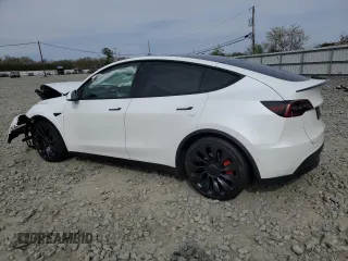 2022 Tesla Model Y Performance with VIN 7SAYGDEF9NF564566, listed as a Copart auction lot 53799715 with 38,963 mi miles and Salvage title. Bid and sale history available at DreamBid. Image 2.