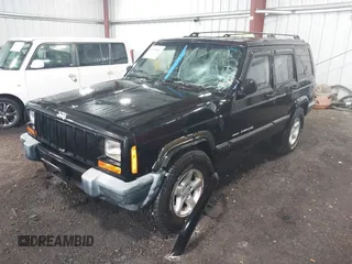 2000 Jeep Cherokee z VIN 1J4FF48S8YL216995, wystawiony jako IAAI lot #42126841 z przebiegiem 178 000 mil mil oraz . Historia ofert i sprzedaży dostępna na DreamBid. Obrazek 6.