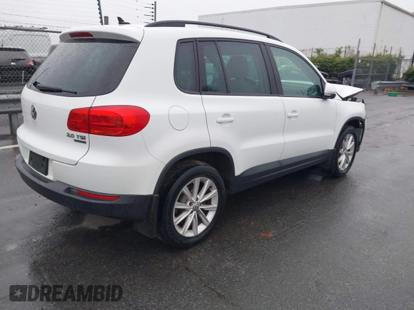 2015 Volkswagen Tiguan SE z VIN WVGBV7AX5FW584833, wystawiony jako IAAI lot #41855476 z przebiegiem 123 299 mil mil oraz . Historia ofert i sprzedaży dostępna na DreamBid. Obrazek 4.