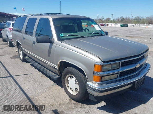 1999 Chevrolet Suburban with VIN 3GNEC16R9XG253081, listed as a IAAI auction lot 41719007 with 196,884 mi miles. Bid and sale history available at carsss.com. Image 1.