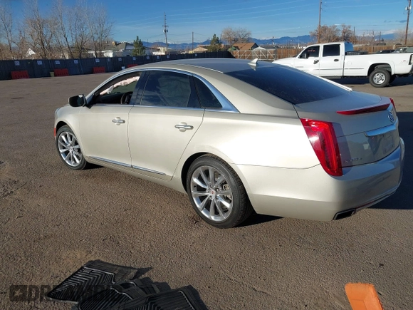 2014 Cadillac XTS Luxury z VIN 2G61N5S3XE9298471, wystawiony jako IAAI lot #41069292 z przebiegiem 92 112 mil mil oraz . Historia ofert i sprzedaży dostępna na DreamBid. Obrazek 3.