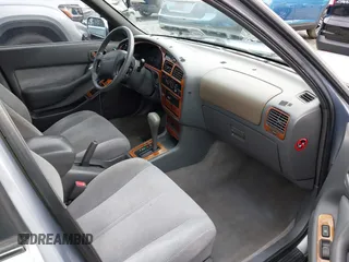 1996 Toyota Camry DX with VIN JT2BG12K2T0396941, listed as a IAAI auction lot 41593032 with 205,514 mi miles. Bid and sale history available at carsss.com. Image 5.