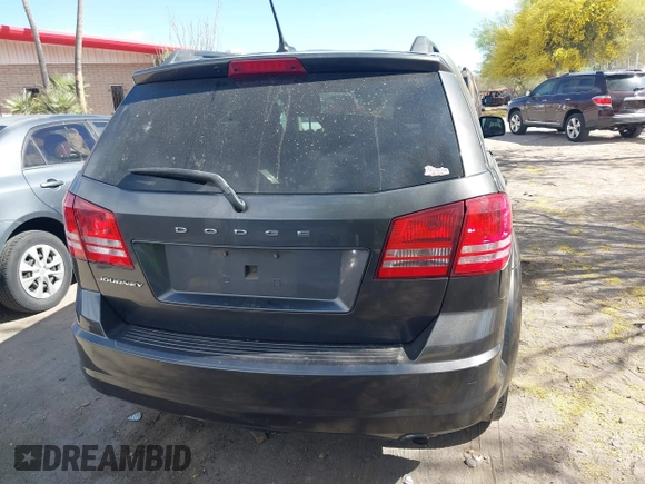 2017 Dodge Journey SE with VIN 3C4PDCAB9HT503979, listed as a IAAI auction lot 42116429 with 176,591 mi miles and . Bid and sale history available at DreamBid. Image 17.