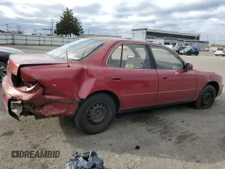 1993 Toyota Camry LE with VIN 4T1SK12E8PU240803, listed as a Copart auction lot 76663004 with 214,911 mi miles and Salvage Title. Bid and sale history available at carsss.com. Image 3.