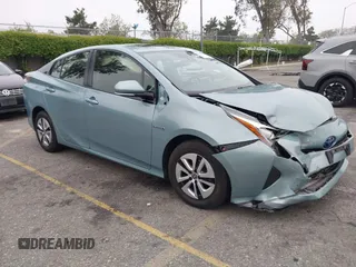 2017 Toyota Prius Two with VIN JTDKARFU7H3052594, listed as a IAAI auction lot 42035969 with 50,789 mi miles and . Bid and sale history available at DreamBid. Image 1.